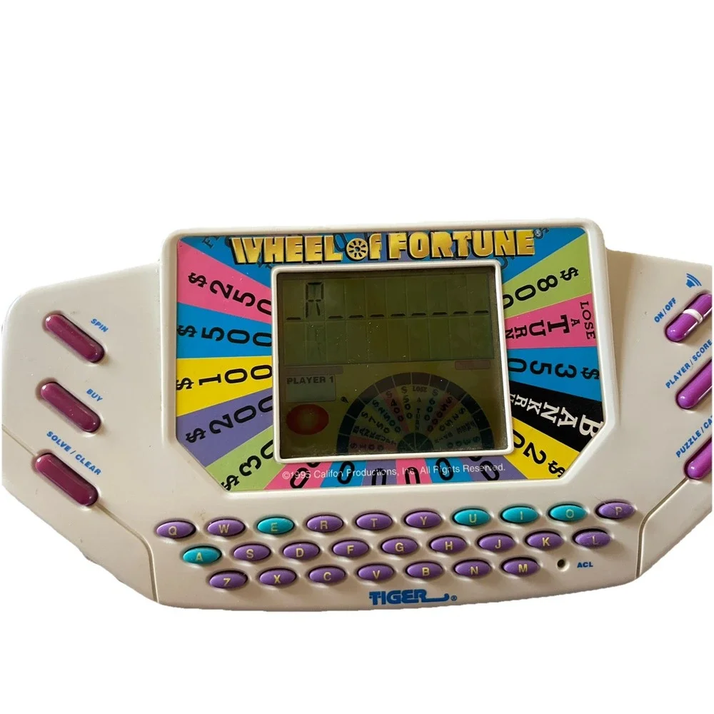 Vintage Tiger Electronics Wheel of Fortune Handheld Game Fun Family Working 1995